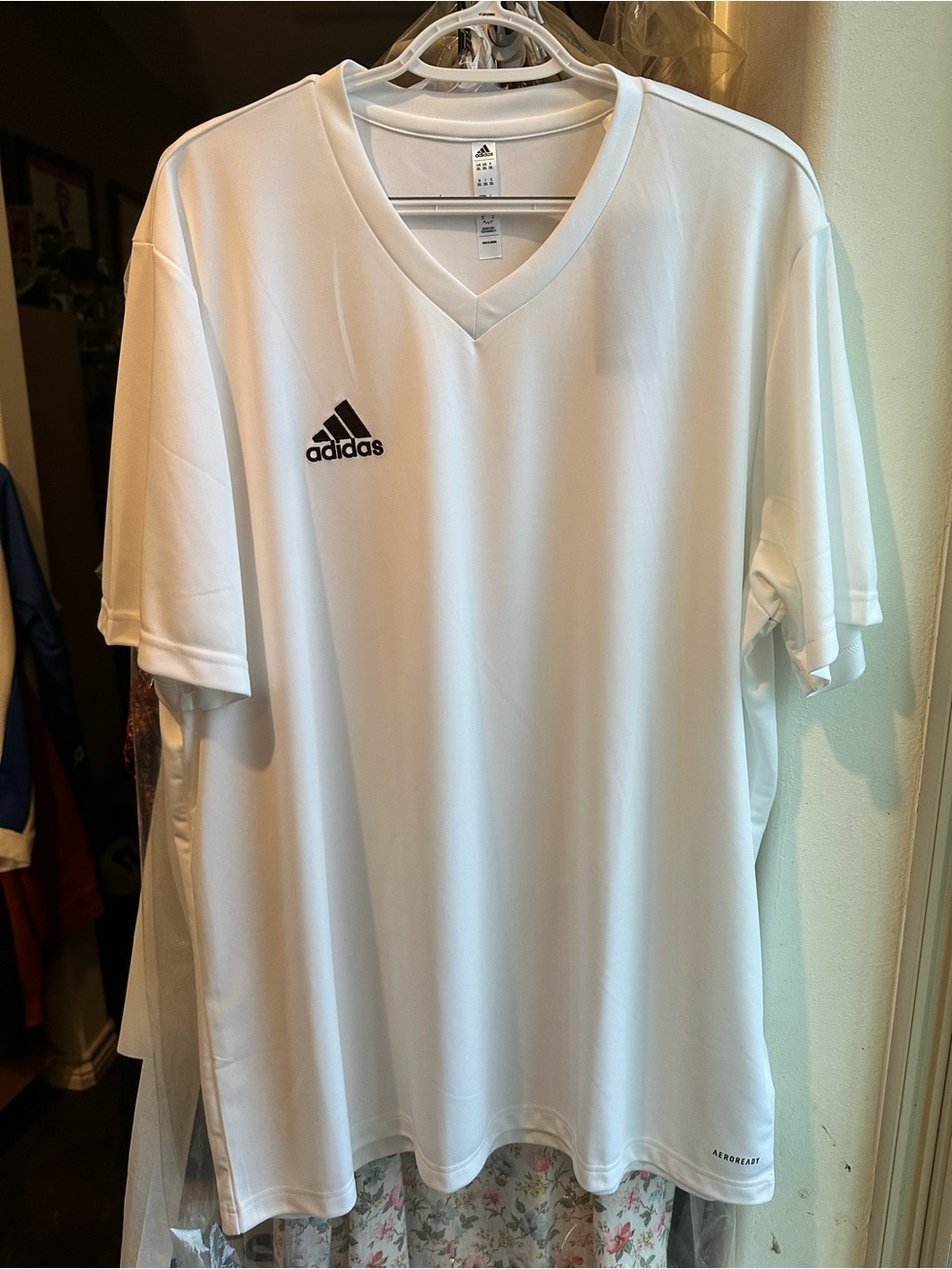 Adidas Entrada 22 Soccer Jersey with a V-neck and moisture-wicking technology